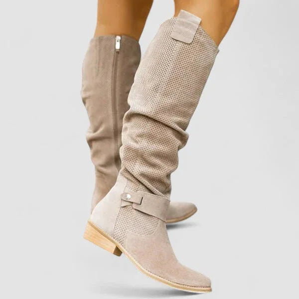 Beige orthopedic western boots with side zipper, ankle straps, and block heel.