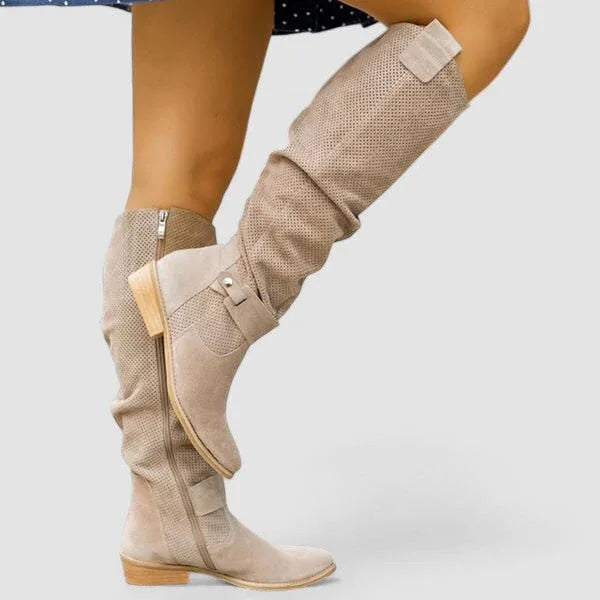 Beige orthopedic western boots with side zipper and double snap ankle straps, block heel.