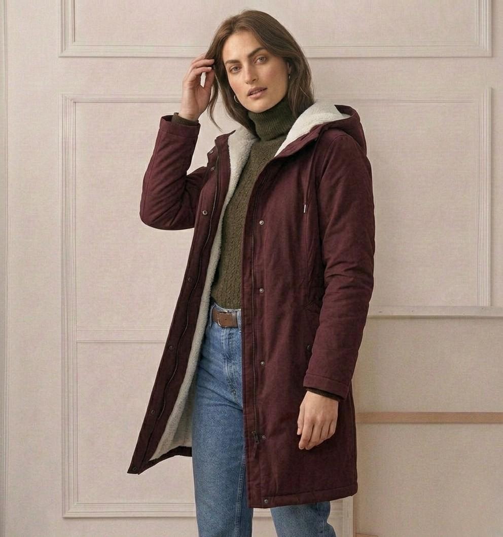 Berry red waterproof long parka with sherpa-lined hood, full zip, and front pockets