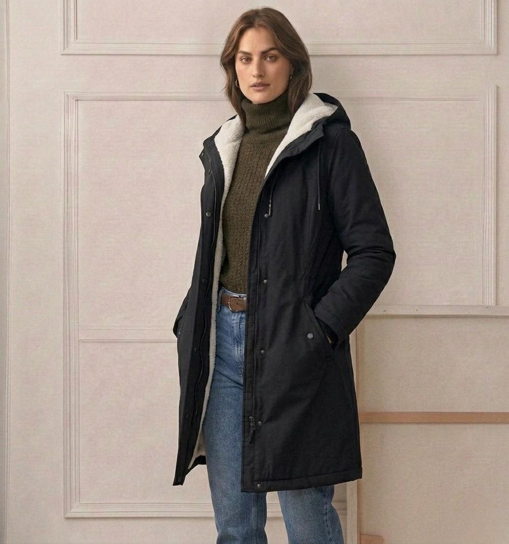 Midnight navy waterproof long parka with hood, sherpa lining, and long profile