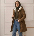 Khaki waterproof long parka with sherpa-lined hood, front zip, and flap pockets