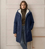 Midnight navy waterproof long parka with hood, sherpa lining, and front pockets