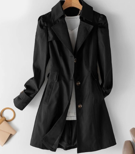 Black women's trench coat with button front, notched lapels, flap pockets