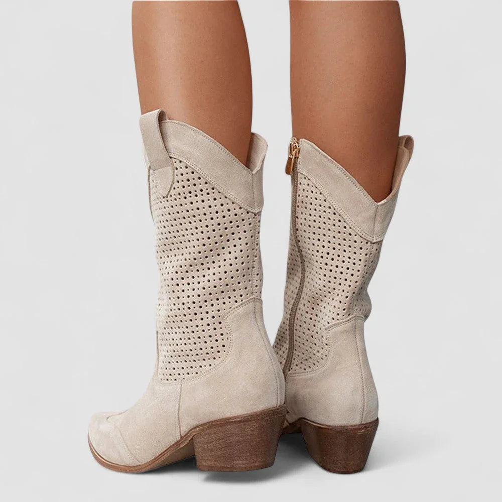 Beige orthopedic western boots with perforated details and low wooden heel