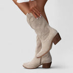 Beige orthopedic western boots with perforated side panels and block heel