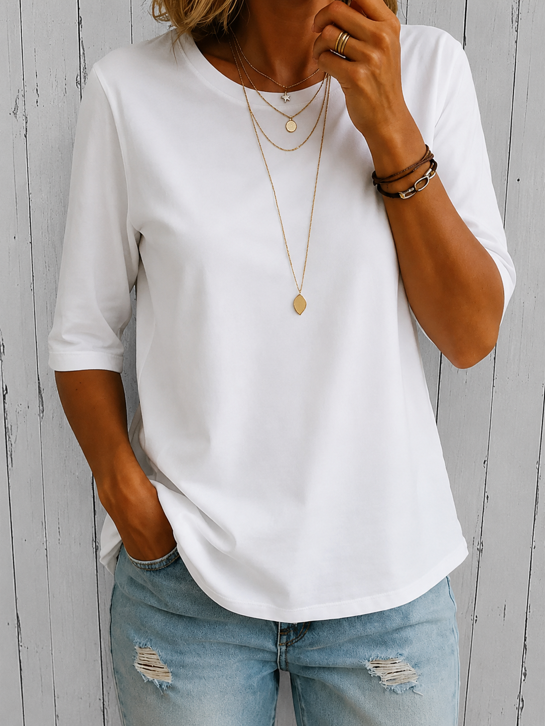 White comfort-coverage tee with three-quarter sleeves