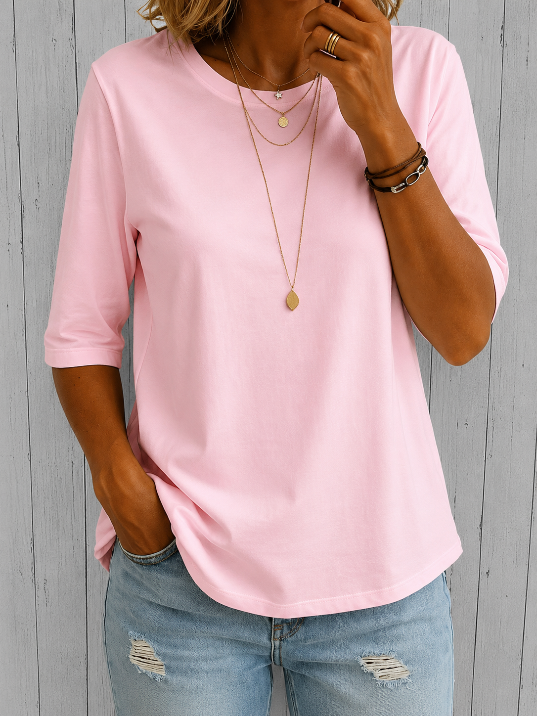 Pink comfort-coverage tee with three-quarter sleeves