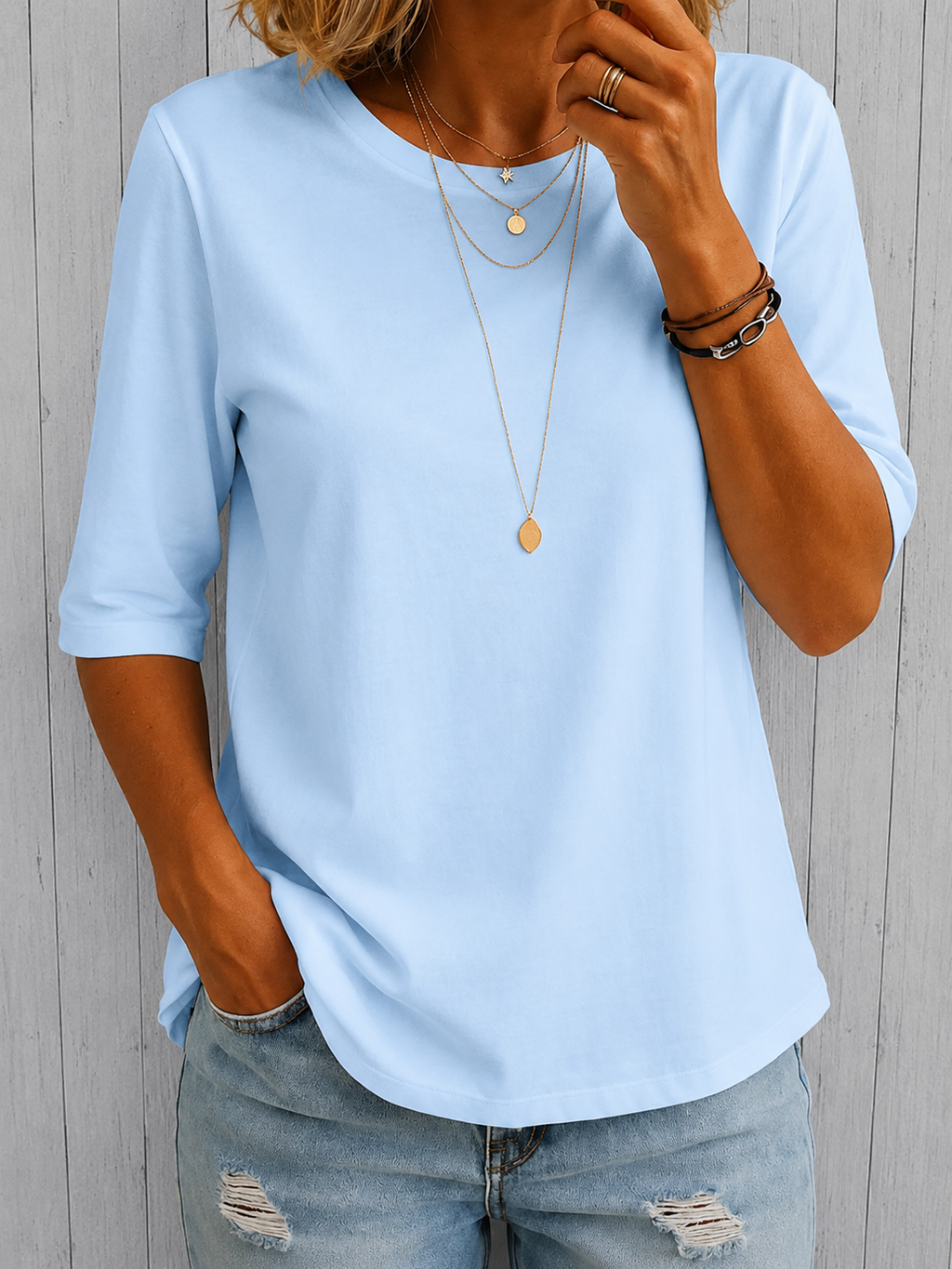 Light blue comfort-coverage tee with three-quarter sleeves