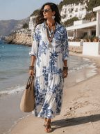 Floral button-front maxi dress with tiered ruffle hem and elbow puff sleeves