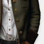 Olive herringbone jacket with gold-tone buttons and flap chest pocket detail
