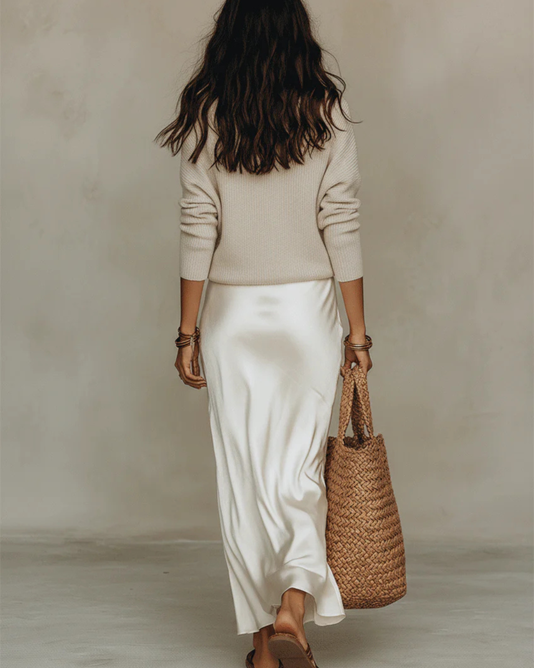 White V-neck knit sweater and satin midi slip skirt, two-piece set