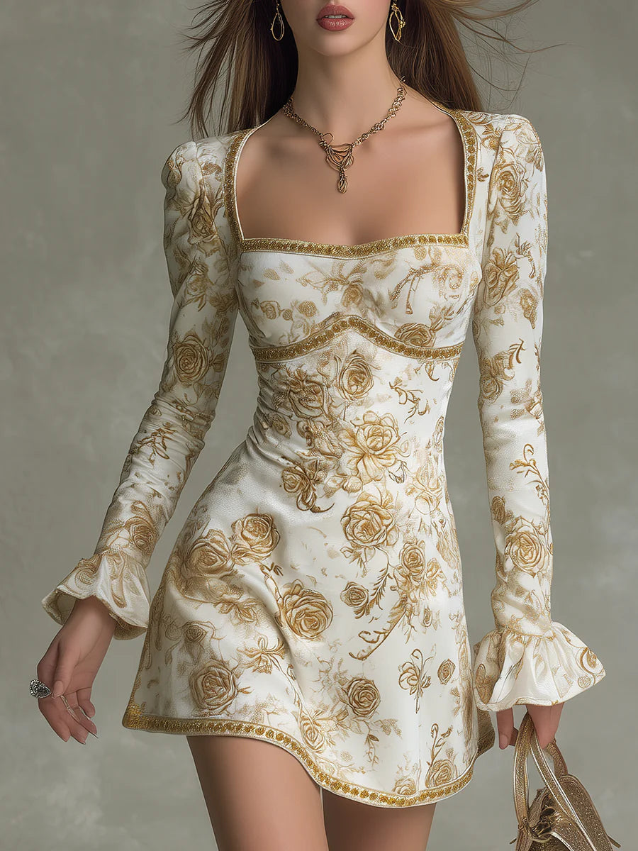 White velvet mini dress with gold rose print, square neckline, long sleeves, ruffled cuffs