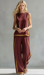 Two-piece set, navy sleeveless top and wide-leg pants with gold edge trim