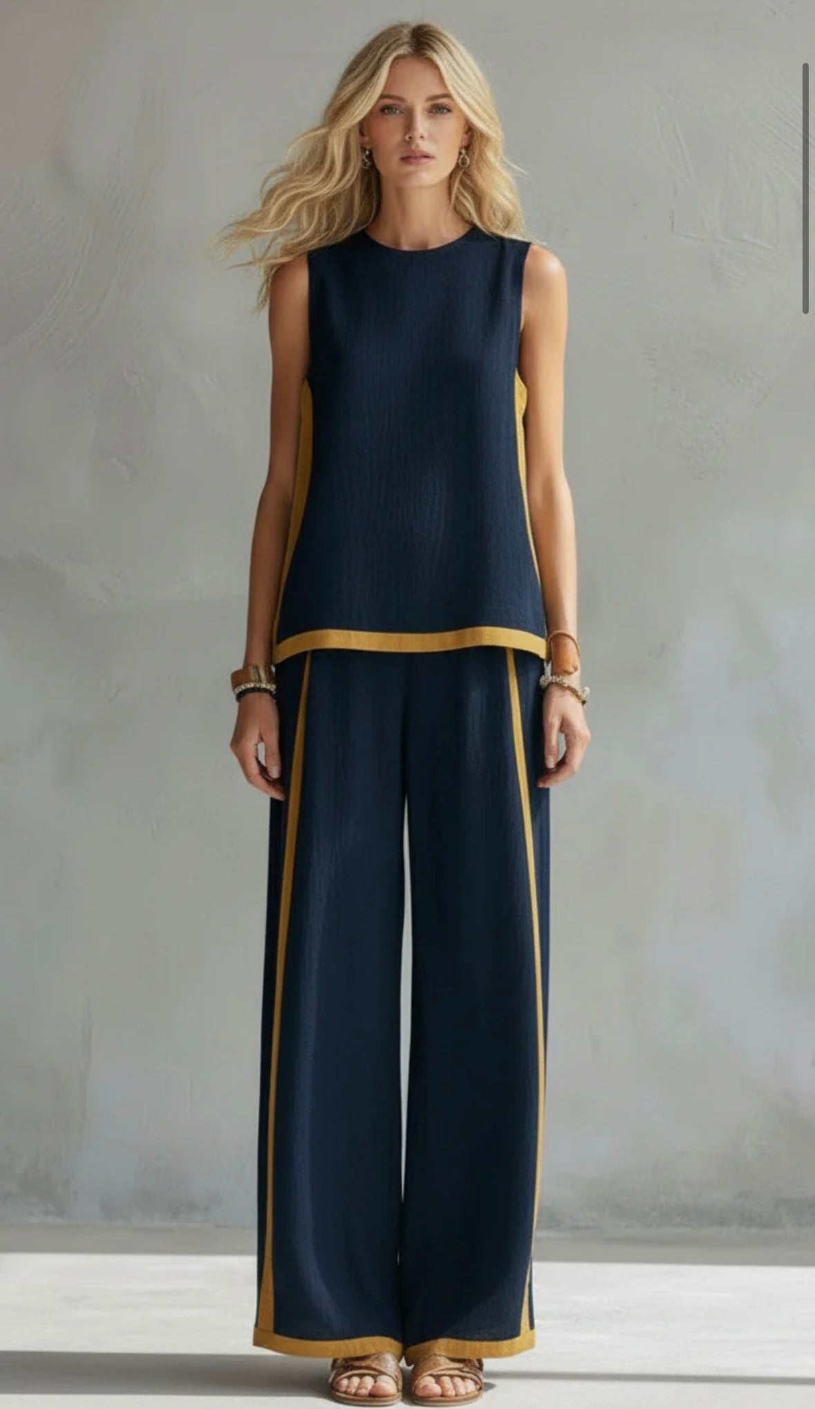 Navy sleeveless top and wide-leg pants two-piece set with gold trim