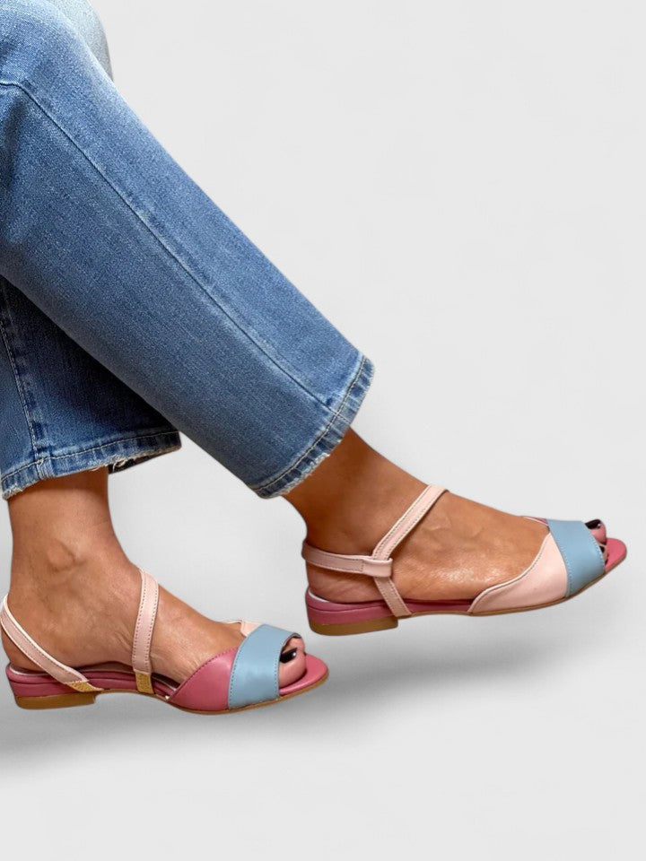 Low open-toe sandals with ankle strap, color blocks, and decorative toe face, pink and blue