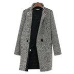 Black-and-white houndstooth winter coat with notch lapels and button front