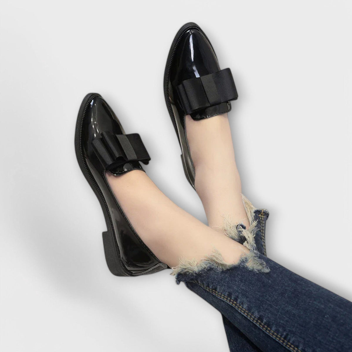 Lauren™ black glossy loafers with black strap buckle and rounded toe