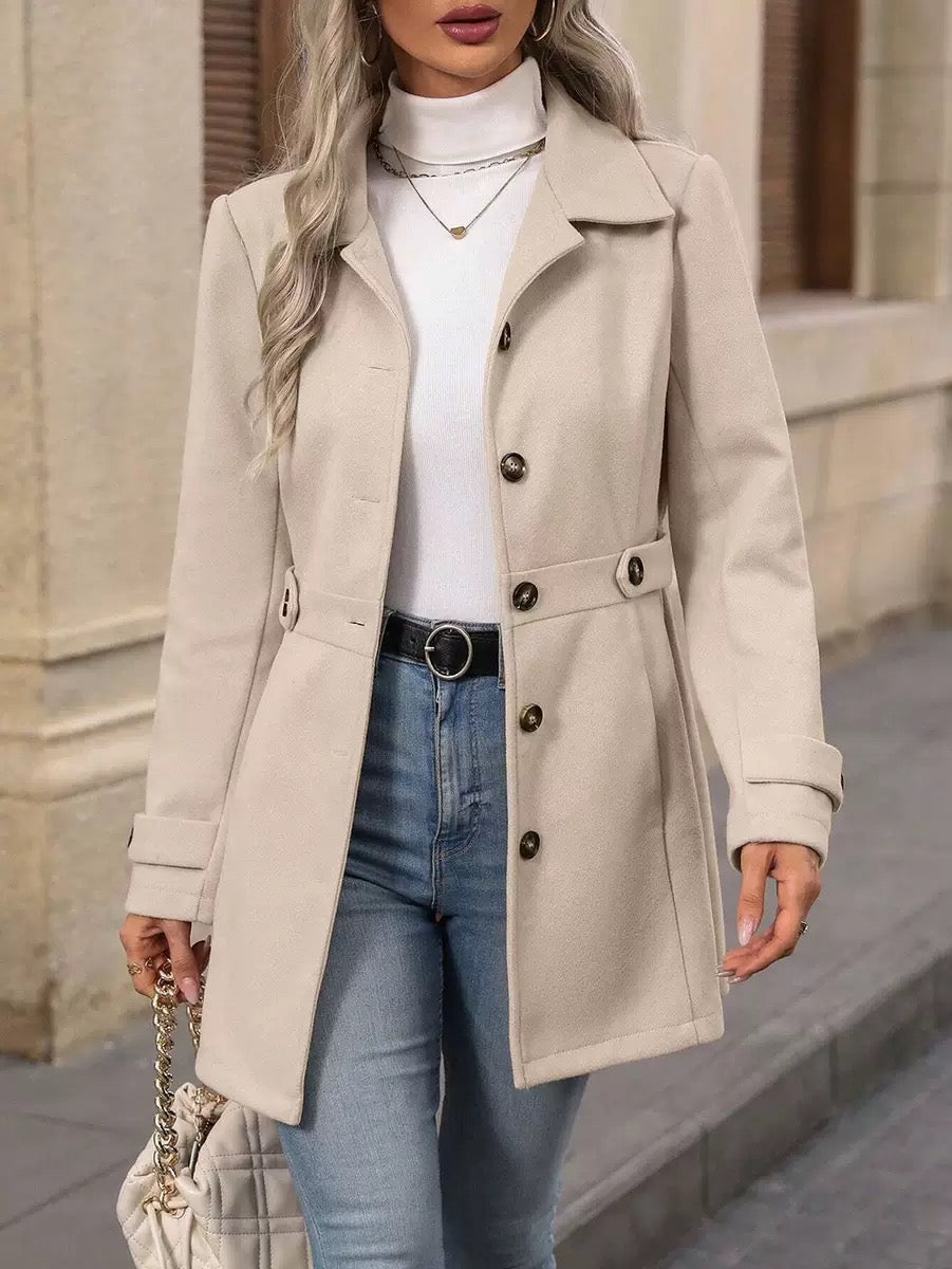 Beige belted coat with notch lapels, button front and cuff tabs