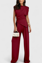 Red sleeveless wrap-style top and wide-leg pants two-piece set