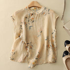 Beige short-sleeve linen top with floral print and buttoned keyhole neckline