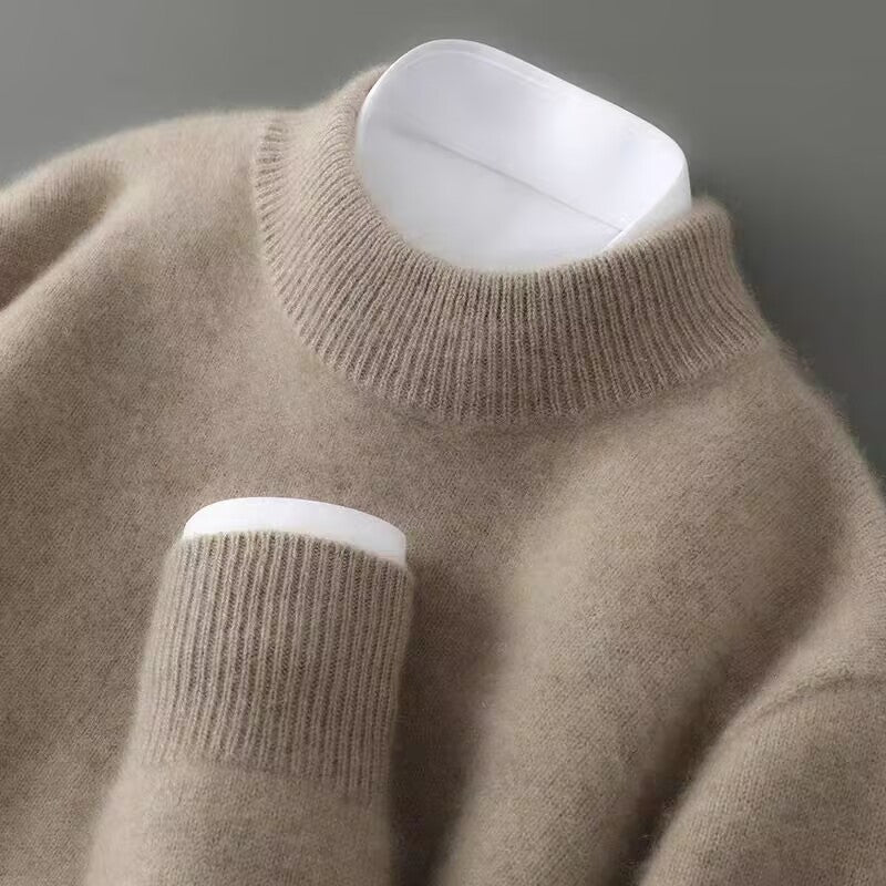 Light brown cashmere mock-neck jumper with ribbed collar and long sleeves.