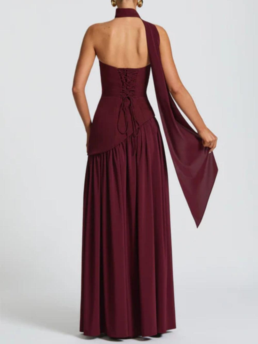 Backless strapless maxi dress with corset lacing and gathered tiered skirt
