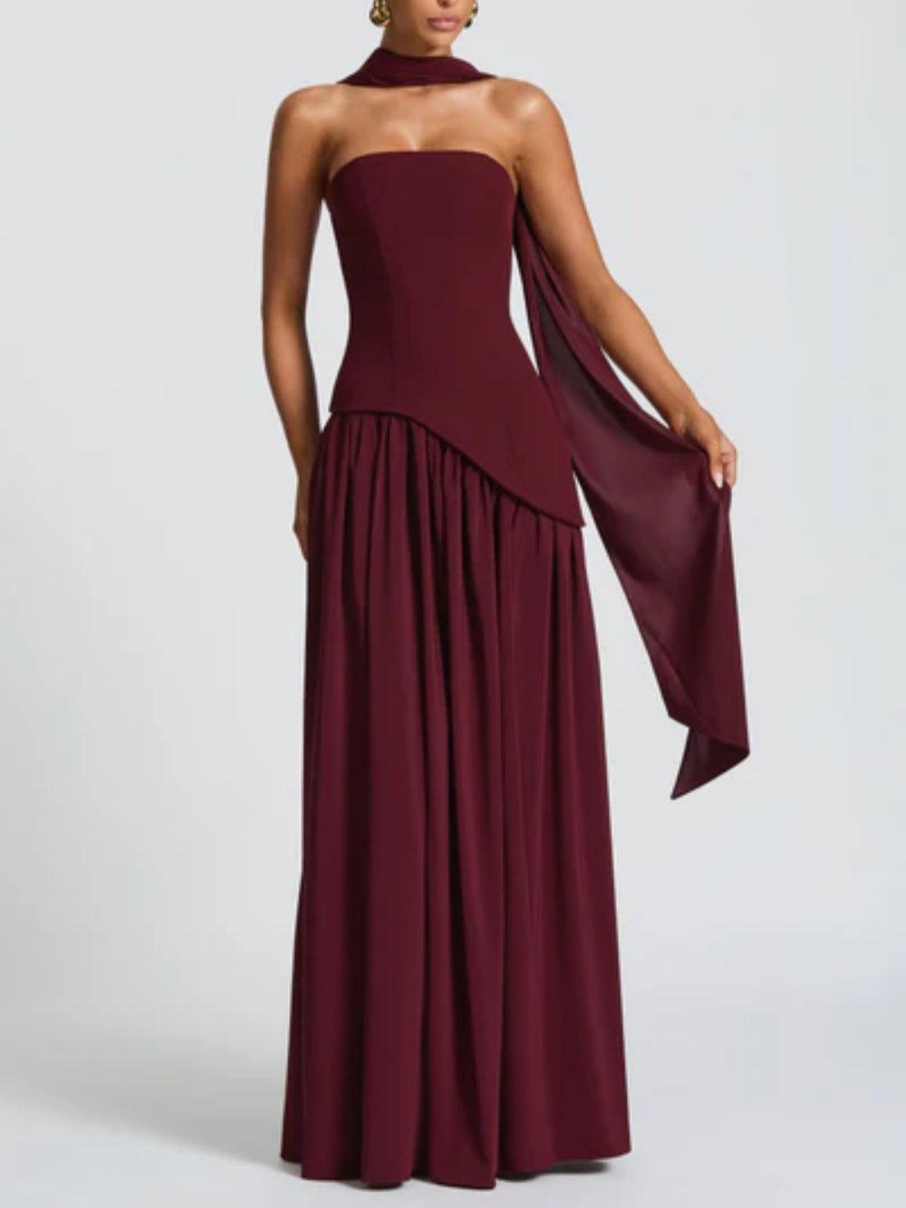 Cherry burgundy strapless maxi dress with gathered skirt and draped side panel