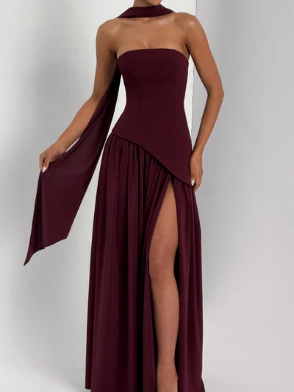 Strapless maxi dress with back halter tie, gathered tiered skirt, and side slit