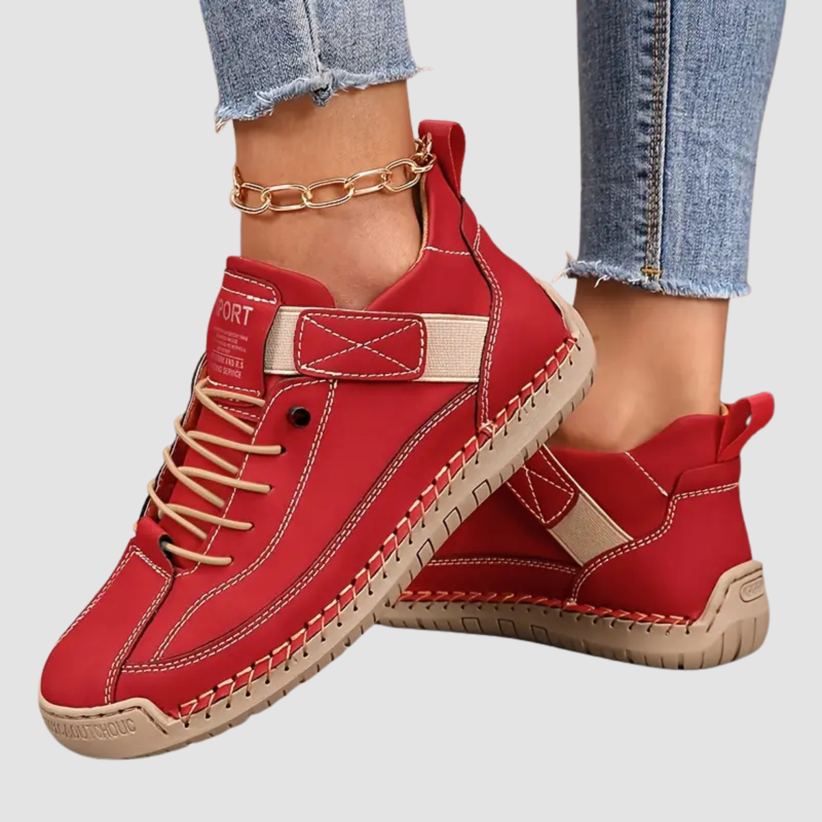 Comfort support sneakers, red lace-up with contrast stitching and ankle chain detail
