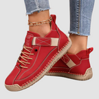 Comfort support sneakers, red lace-up with contrast stitching and ankle chain detail
