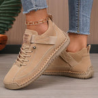 Beige comfort support sneaker with lace-up, ankle chain, and boot-style ankle support