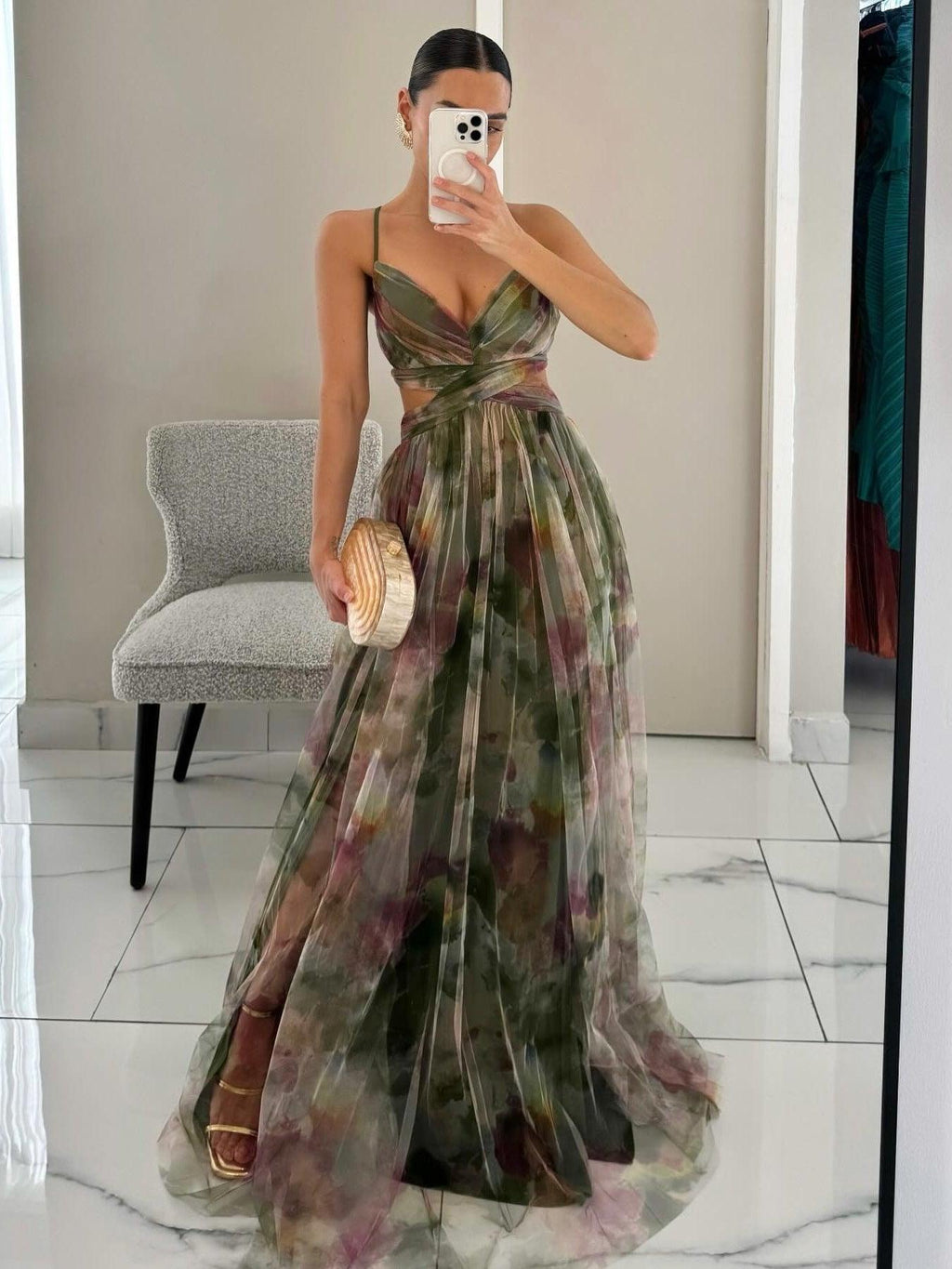 Maxi A-line V-neck dress with green painted floral print, spaghetti straps and waist tie