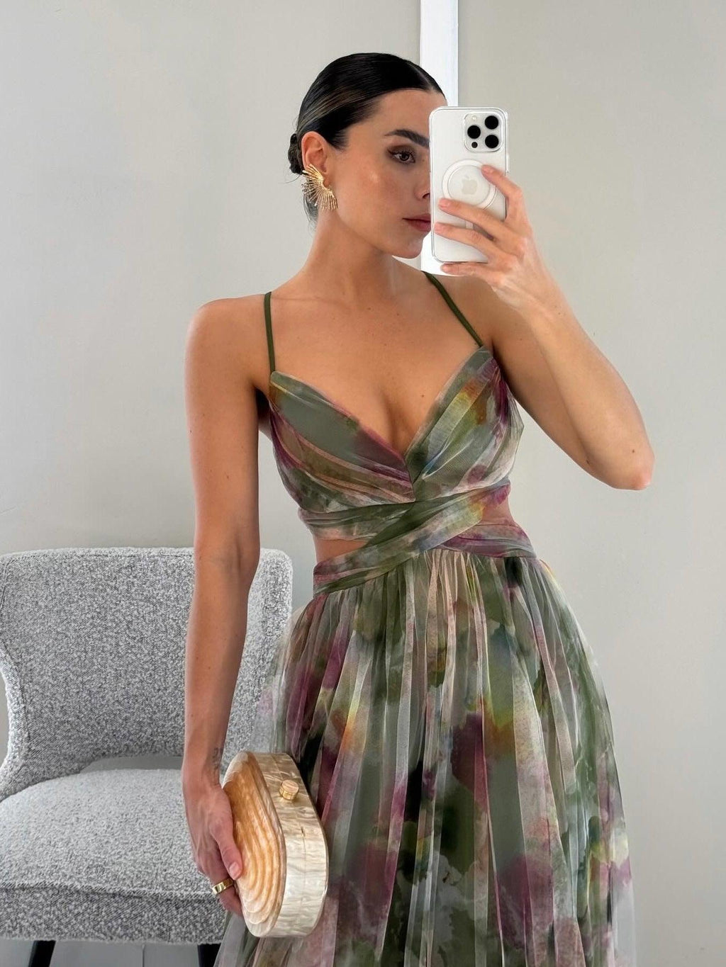 Maxi A-line dress with green painted floral print, thin straps and V neckline