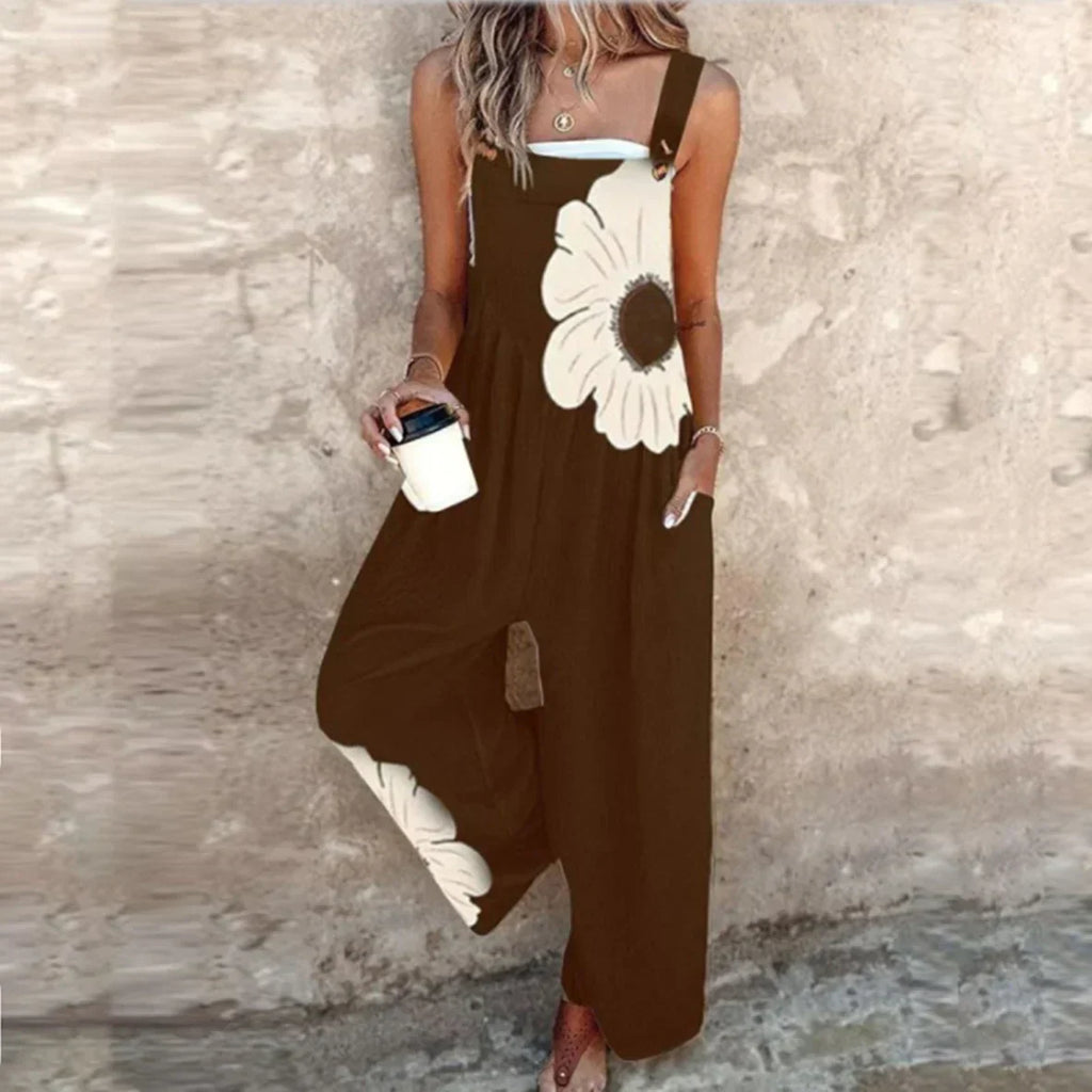 Brown sleeveless jumpsuit with white daisy print and roomy wide-leg design