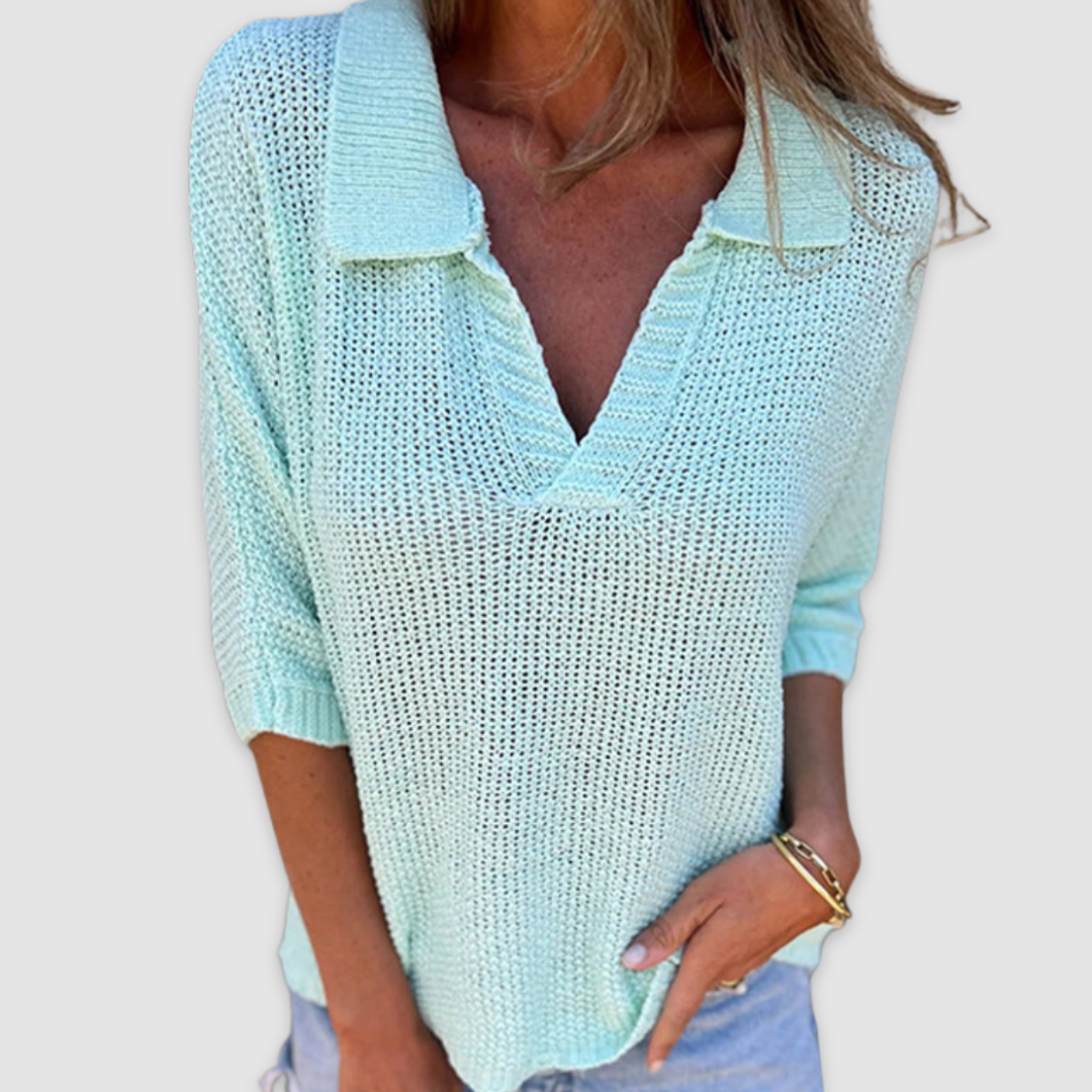 Light blue V-neck textured knit top with three-quarter sleeves