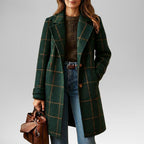 Dark green plaid tweed coat with notch lapels and front button closure