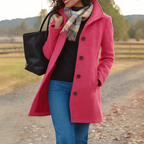 Pink long button-front coat with notched lapels and flap pockets, lined.