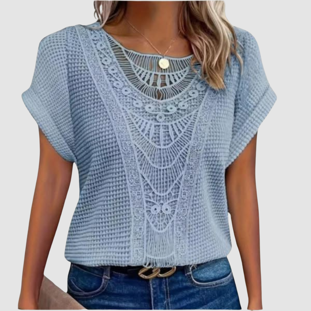 Light blue lace crochet top with scalloped yoke and open-knit sleeves