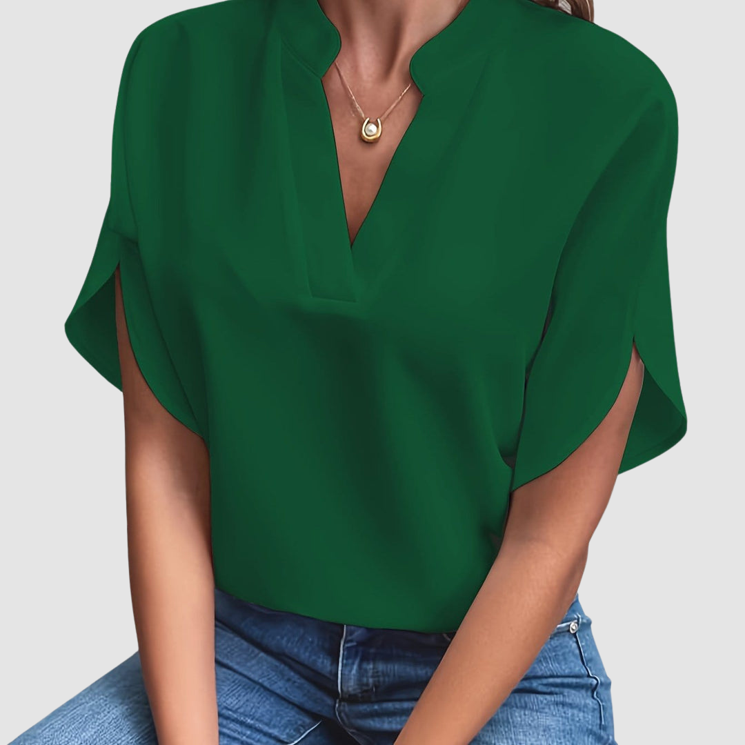 Green draped blouse with V-neck and short dolman sleeves, loose side drape