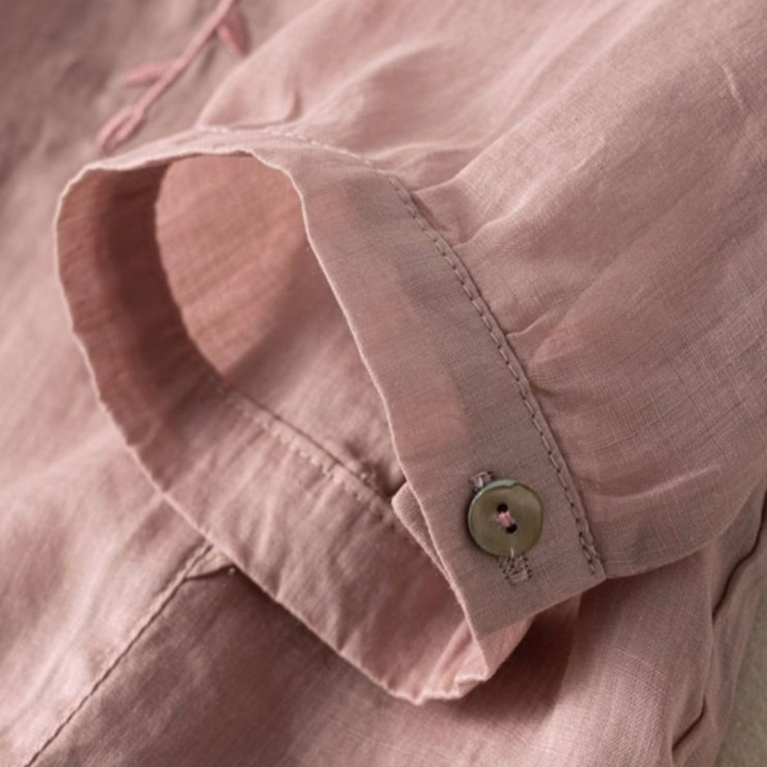 Lilac cotton-linen cuff with button detail on loose top