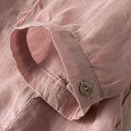 Lilac cotton-linen cuff with button detail on loose top