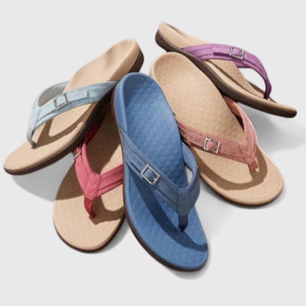 Pack of orthopedic sandals in blue, pink, and tan with adjustable straps