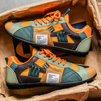 Retro sneakers in a box: orange, teal and green panels with orange lace-up