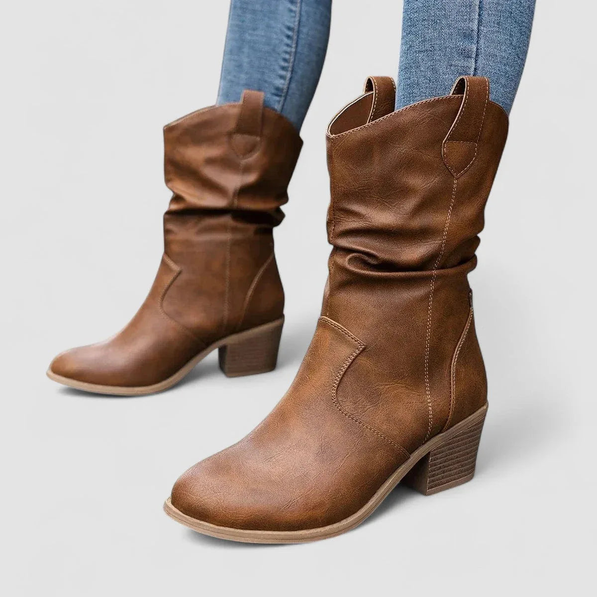 Brown leather orthopedic ankle boots with ruched upper and low chunky heel