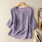Lavender embroidered blouse, round neck, three-quarter sleeves, vertical textured front