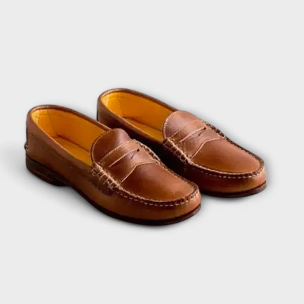 Women's classic loafers, caramel-brown slip-on pair with warm tan lining