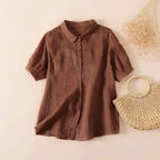 Brown short-sleeve button-up shirt with collar and front placket