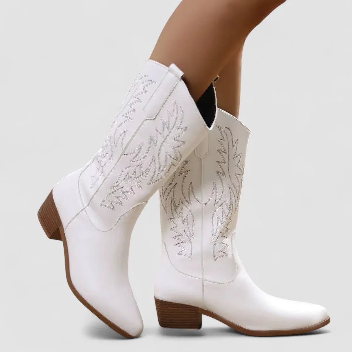 White orthopedic western boots with leaf embroidery and stacked block heel