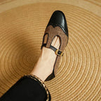 Vintage T-strap shoes, black leather and tan woven upper with gold buckle strap