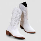 White orthopedic western boots with leaf embroidery and dark elastic gore panels